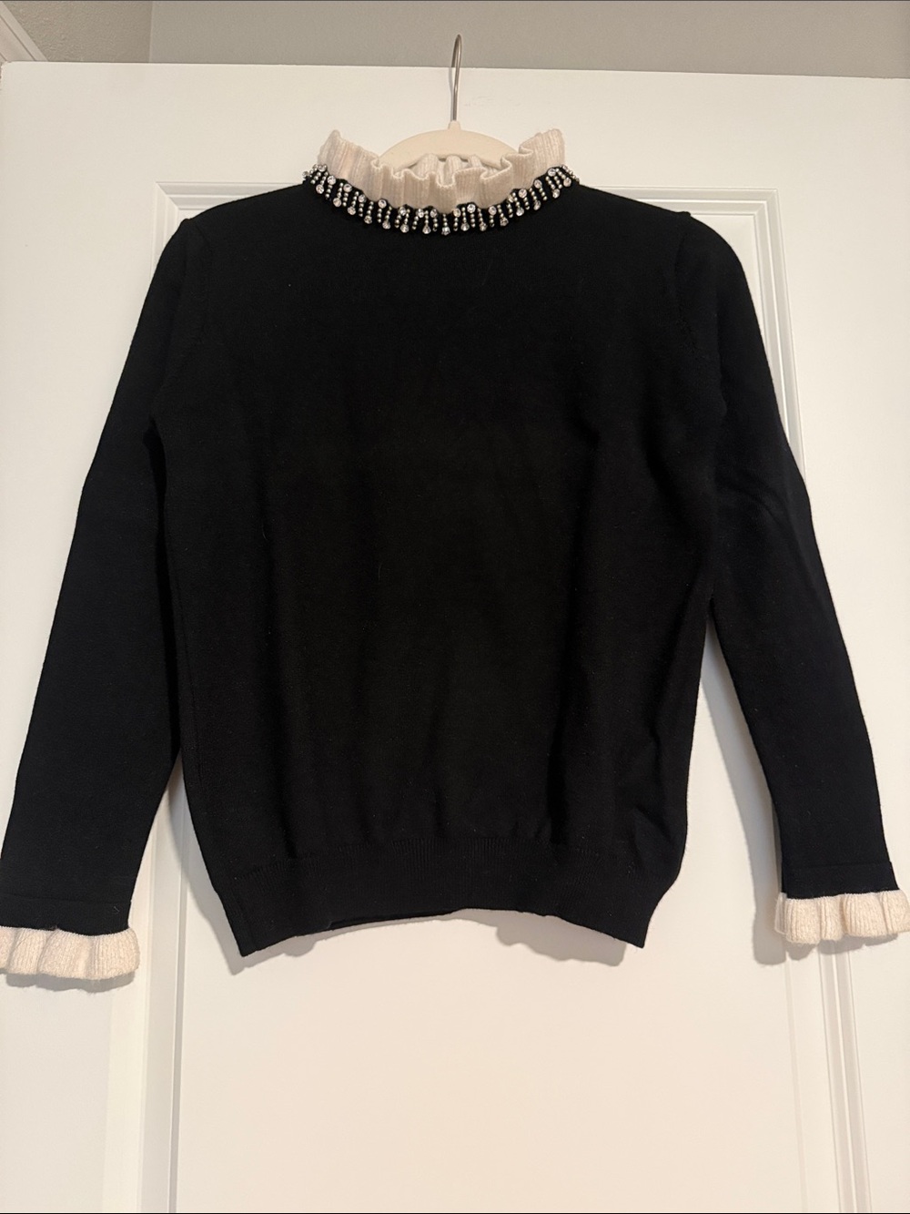 Black Crewneck Sweater with Ivory Ruffle and Beaded Trim